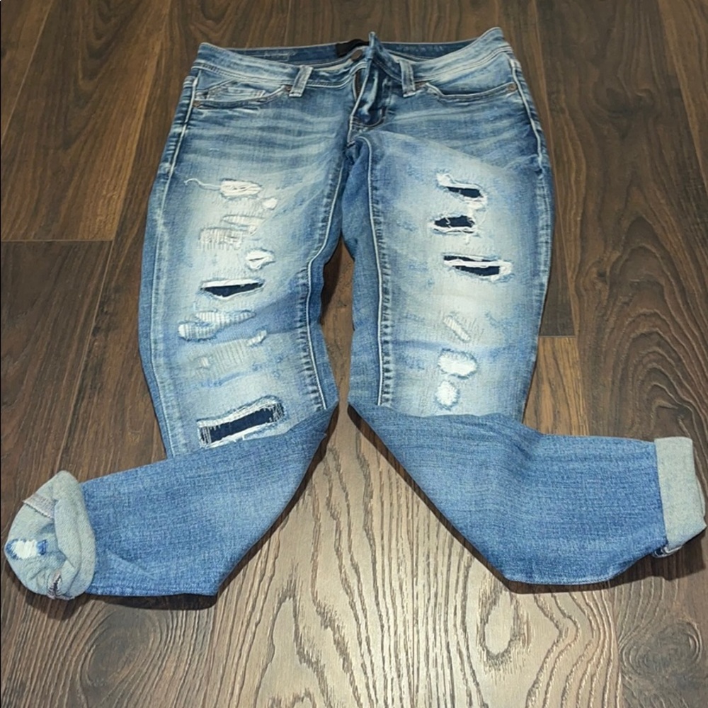 Buckle back skinny jeans